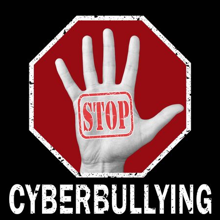 Stop cyberbullying conceptual illustration. Open hand with the text stop cyberbullying. Global social problemの写真素材