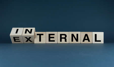 external - internal. Cubes form the words external - internal. business conceptの写真素材
