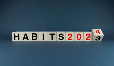 Habits 2023-2024. The cubes form the expression Habits 2023-2024. Habit planning and lifestyle conceptの写真素材