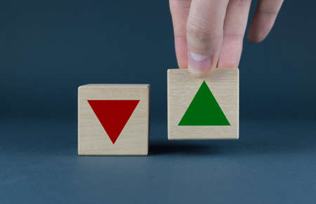 Up - down arrow signs. Cubes with signs Concept of price or profit in business.の写真素材