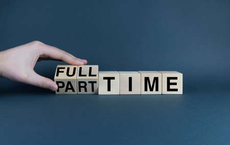 Full Time - Part Time. The cubes form the words Full Time - Part Time. business and job conceptの写真素材