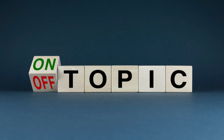 Ontopic - offtopic. Cubes form the words Ontopic - offtopic.の写真素材