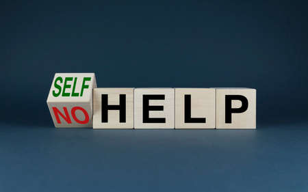 No help or self help. Cubes form words No help or self help. Support conceptの写真素材