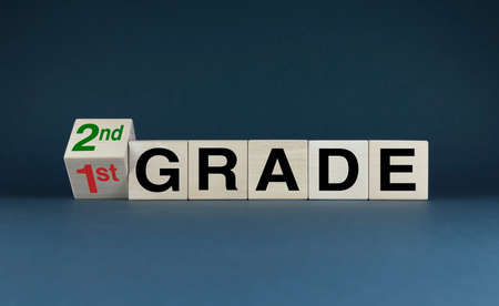 1st grade to 2nd grade. Cubes form the words 1st grade to 2nd grade.の写真素材