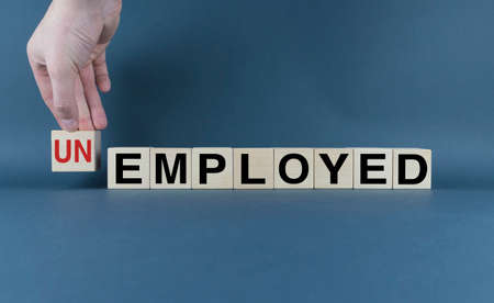 Unemployed or Employed. Cubes form the words Unemployed or Employed. Employment conceptの写真素材