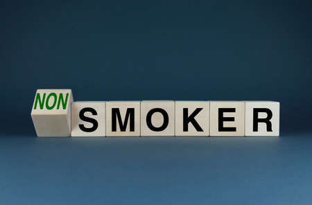 Smoker or non-smoker. Cubes form the words Smoker or Non smoker. The concept of Smoker or Non smokerの写真素材