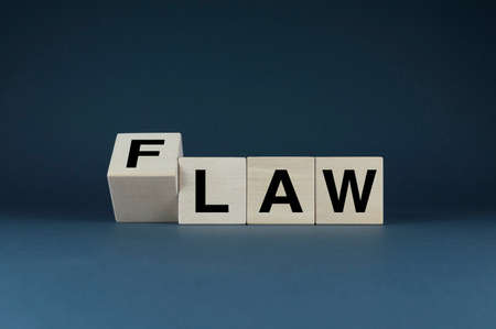 Law or Flaw. Cubes form the words Law or Flaw. concept of jurisprudenceの写真素材