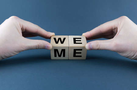 We or Me. Cubes form words We or Me. The broad concept of egoism in business and personal life and...