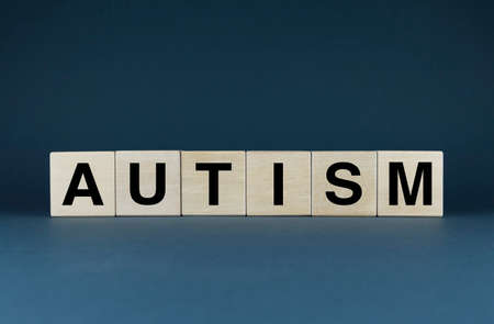 autism. Cubes form the word Autism. Concept of Autism - a disease of the nervous system in medicineの写真素材