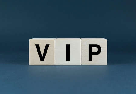VIP. Cubes form the word VIP. The concept of the abbreviation VIP - Very Important Personの写真素材