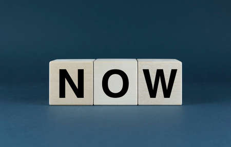 now. Cubes form the word Now. An extensive concept of the word Now used in various areas of business and lifeの写真素材