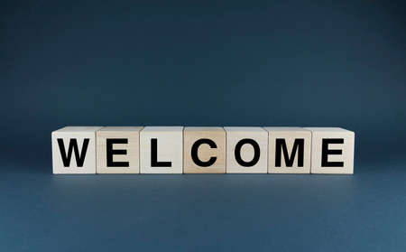 Welcome. Cubes form the word welcome. The concept of the word Welcome is a greeting used in various areas of business and personal life.の写真素材