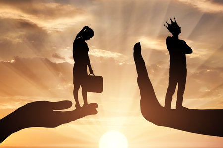 Inequality and sexism. A distressed woman on a begging hand and an arrogant man with a crown standing on the stop hand. Concept of inequality and selfishness both in business and life. Silhouetteの写真素材