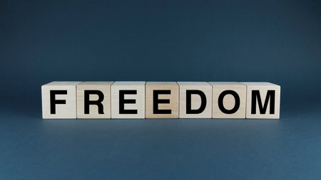 freedom. Cubes form the word Freedom. The broad concept of the word Freedom is applied both in business and life and not onlyの写真素材