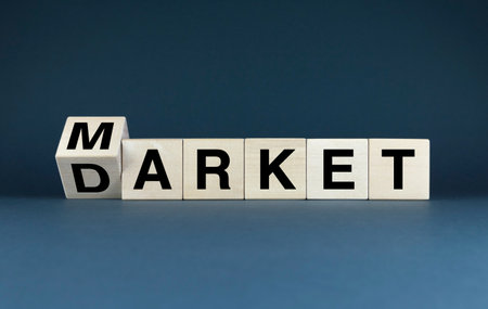 Wooden blocks spelling out the words Market. Concept hidden, underground economy or the darker side of commerceの写真素材