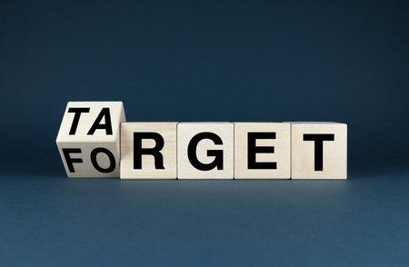 Wooden blocks spelling out Forget. Concept marketing strategy, customer retention, and the consequences of neglecting customer needsの写真素材
