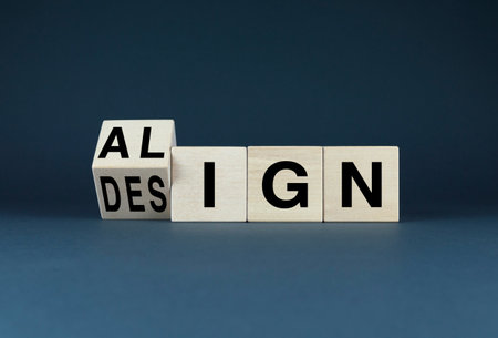 Concept image featuring wooden blocks spelling out the words ALIGN and DESIGN. Concept importance of...