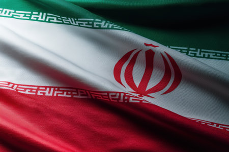 Rich textured Iranian flag detail showing the emblem and vibrant colors. Perfect for national pride, cultural, or political projects.の素材