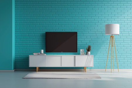 A modern media setup with a TV and stand against a vibrant teal brick wall. The contemporary design is completed with a minimalist floor lamp and decor.の素材