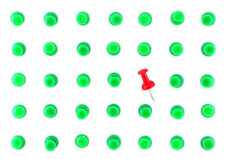 A red pin can't find place between red onesの写真素材