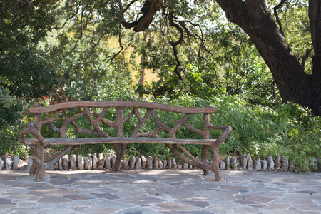 Inviting bench in a city parkの写真素材