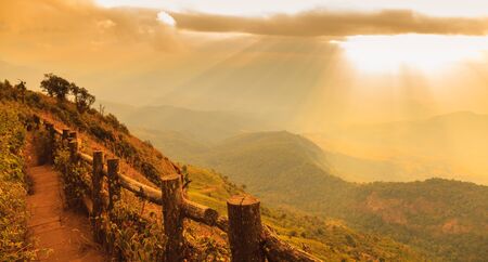 sunrise with clouds, light rays and other atmospheric effectの写真素材