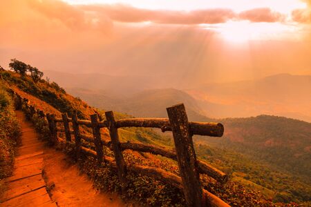 sunrise with clouds, light rays and other atmospheric effect
