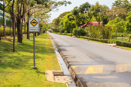 Warning traffic sign. Uneven road.の写真素材