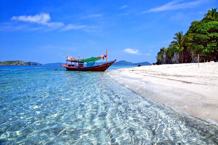 The beaches of tropical sea with boats and beautiful sky.の写真素材