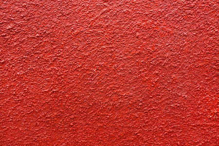 Texture of the red cement wall for the background.