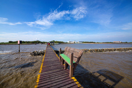 Wooden bridge, scenic spot by the sea on a beautiful day.の写真素材