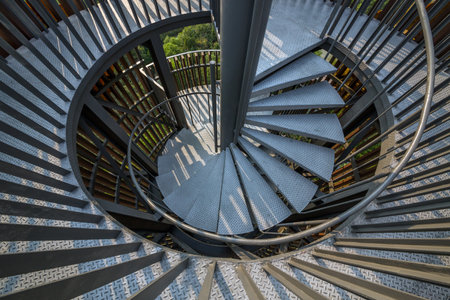 Spiral staircase tower overlooking the park.の写真素材