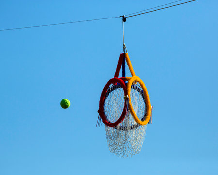 THE  OFFICIAL  HOOP and  SEPAKTAKRAW  BALL On the sky background.の写真素材