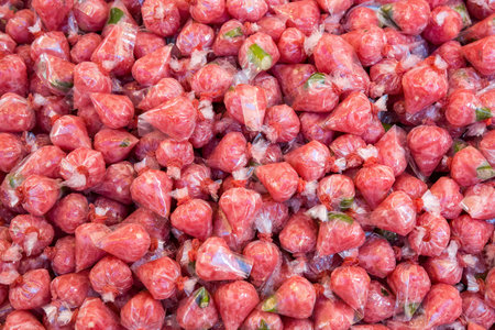 Pork sausage marinated in plastic.の写真素材