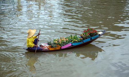 Rowing boats to sell things at the water market.
