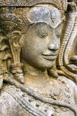 stone head on the wall,side viewの写真素材