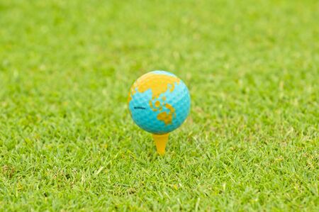 golf ball on teeの写真素材
