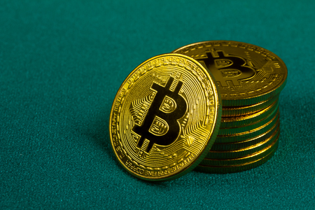 bit coins on green backgroundの写真素材