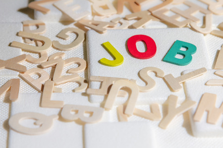 Jobs search concept, colourful wooden text word "Jobs"の写真素材