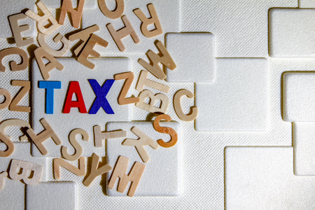 TAX concept, colourful wooden text wordの写真素材