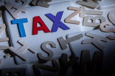 TAX concept, colourful wooden text wordの写真素材