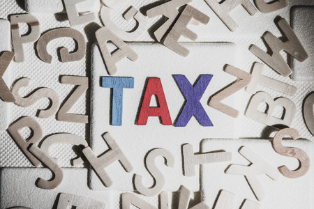 TAX concept, colourful wooden text wordの写真素材