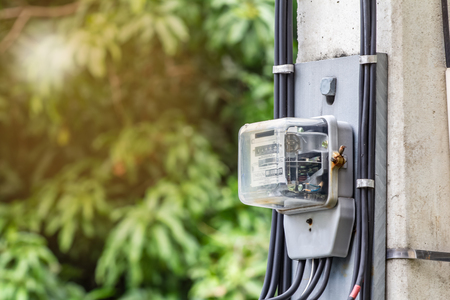 Electric power meter measuring power usage. Watt hour electric meter measurement toolの写真素材