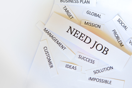 Jobs search concept, Torn newspaper headlines ,copy spaceの写真素材