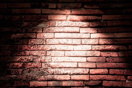 brick wall wiht light spot background.の写真素材