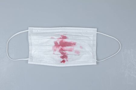 dirty surgical mask Mask protection against pollution, virus, flu and corona virus concept.の写真素材