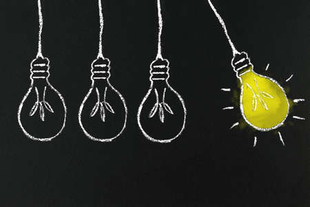 Group of light bulb on chalk board . Illustration background .idea and education concept.の写真素材