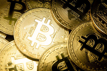 Bitcoin. Crypto currency Gold Bitcoin, BTC on black background Blockchain technology, bitcoin mining...
