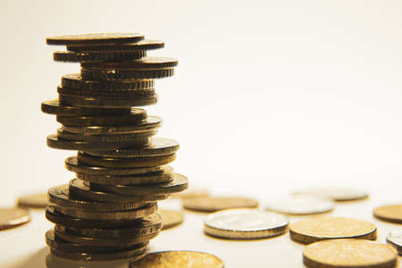 Money tower coins,Coins stacked on each other in different positions,coins for finance and business concept with copy space.の写真素材