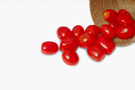 Fresh tomato in the basket.の写真素材
